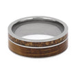 Ring with wooden inlay and silver band on a white background