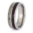 Silver ring with a colorful inlay on a white background