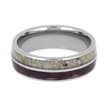 Silver ring with a colorful inlay on a white background