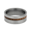 Silver ring with a wooden inlay on a white background