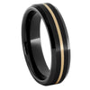 Black ceramic ring with yellow gold pinstripe