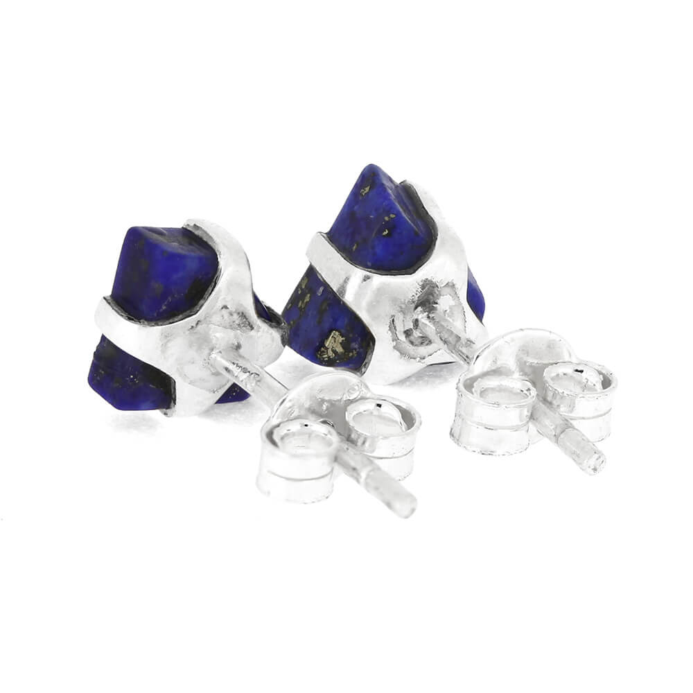 Pair of silver stud earrings with blue gemstones on a white background