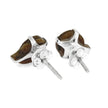 Pair of silver stud earrings with brown gemstones on a white background