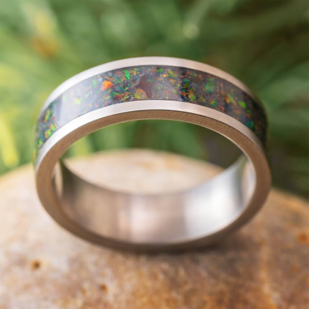 Dark opal wedding band with titanium and opal inlay