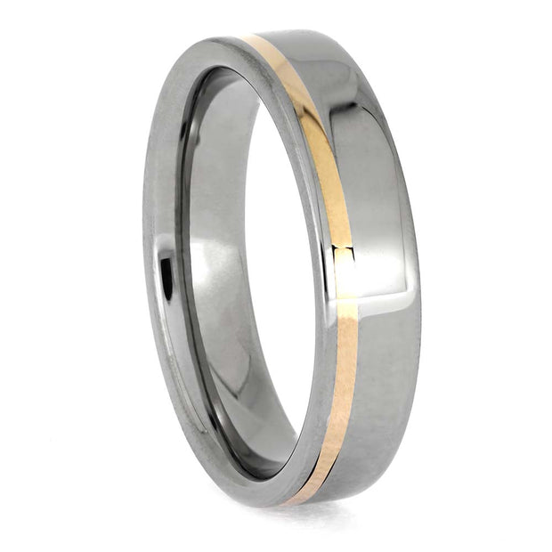 Silver ring with a gold stripe on a white background
