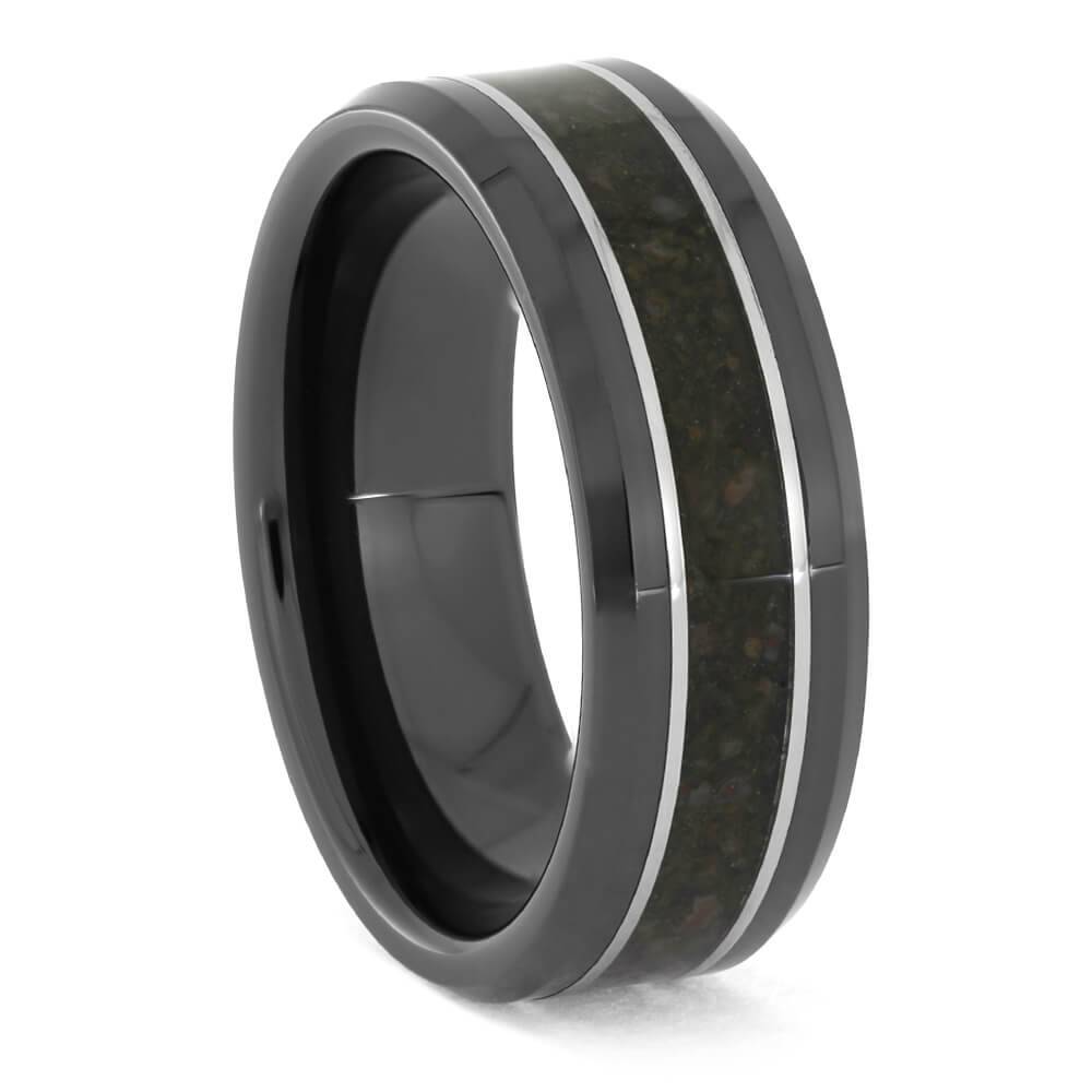 Black ring with crushed dinosaur bone and titanium pinstripes
