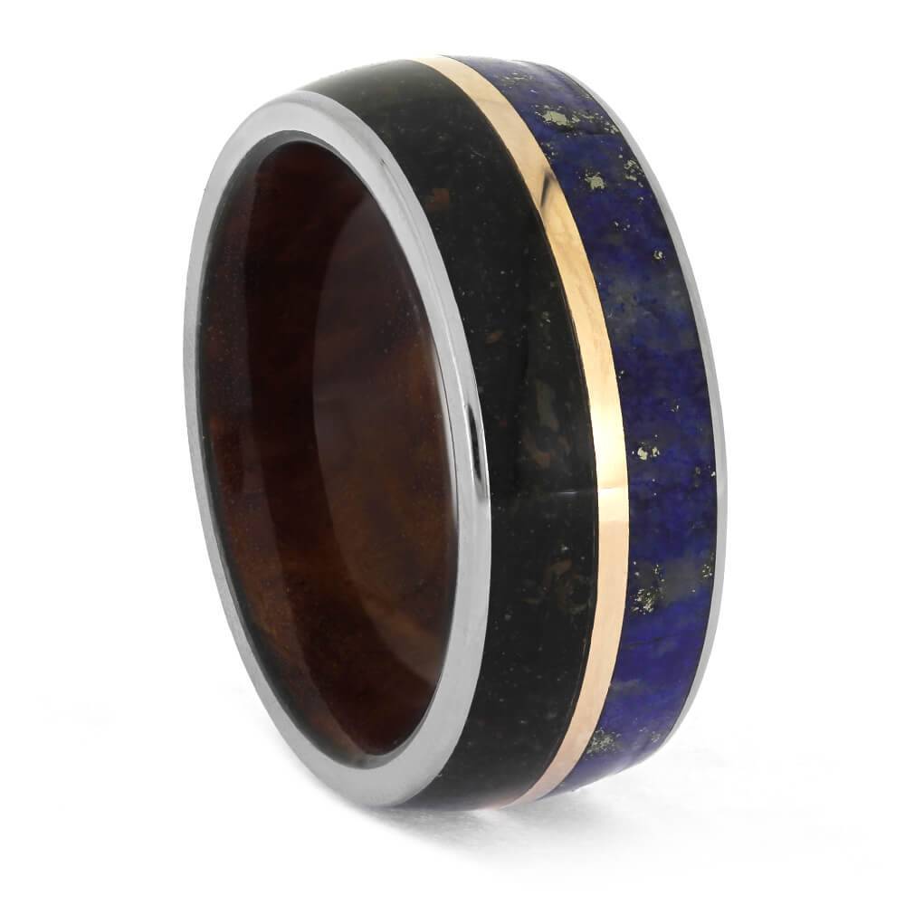 Unique wedding band featuring dinosaur bone and lapis lazuli inlay