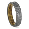 Meteorite wedding band with burl wood sleeve