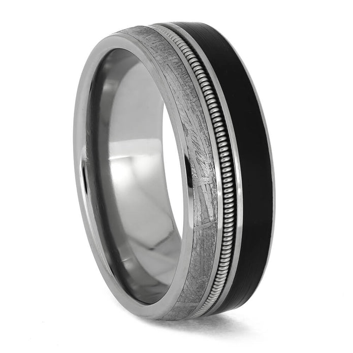 Meteorite titanium ring with guitar string inlay