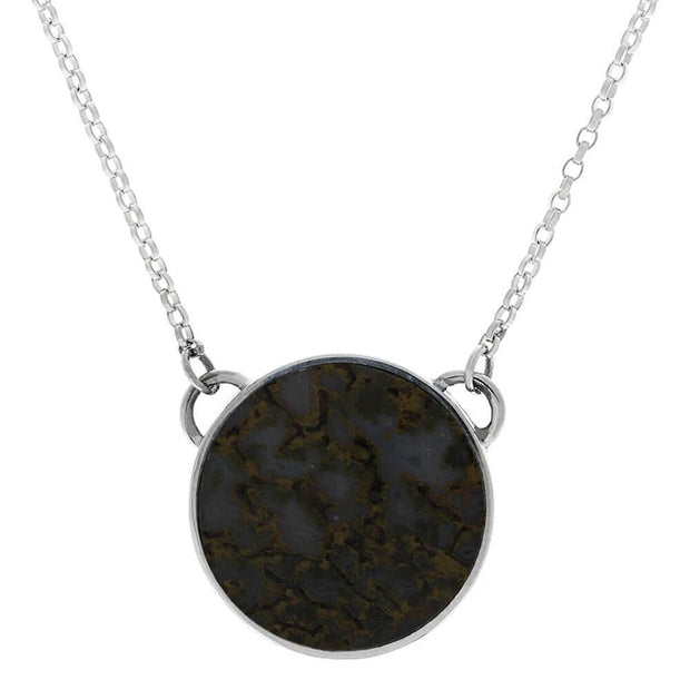 Navy blue dinosaur bone necklace in sterling silver bezel.