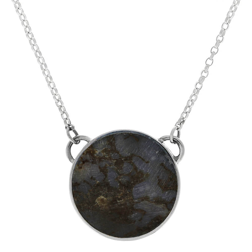 Brown-veined blue dinosaur bone necklace in silver bezel