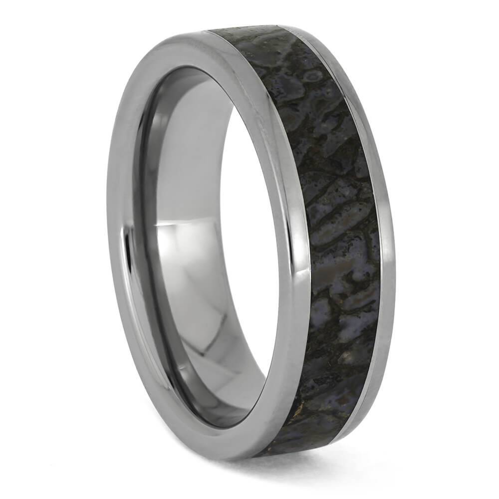Dinosaur bone inlay ring set in titanium