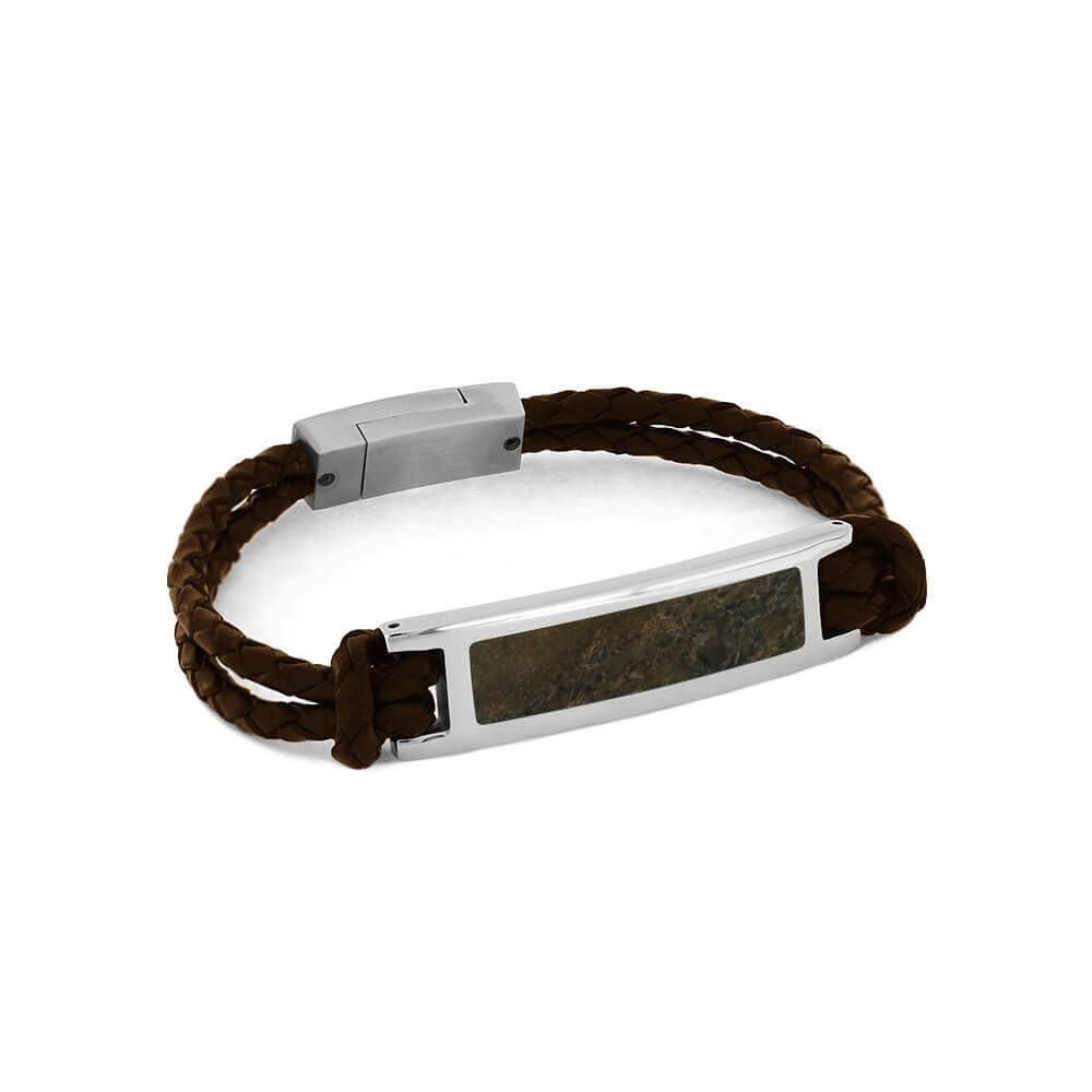 Layered dinosaur bone bracelet with leather band