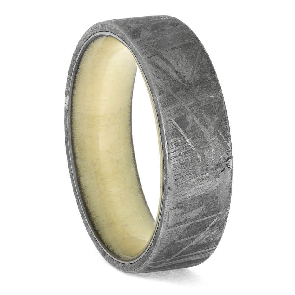 Men's 7mm Gibeon meteorite ring with silver-toned finish and natural Aspen wood interior sleeve. Unique in-stock wedding band design.