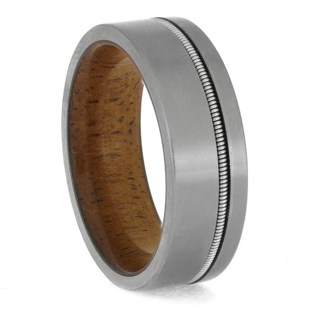 Guitar String Titanium Ring with Wood Sleeve featuring a matte silver finish and mahogany wood interior, ideal for musicians and men's wedding bands.