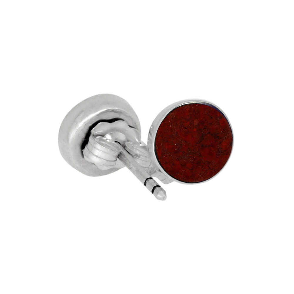 Single red opal stud earring with sterling silver setting. Vibrant and bold, ideal for adding a pop of color to your jewelry collection.