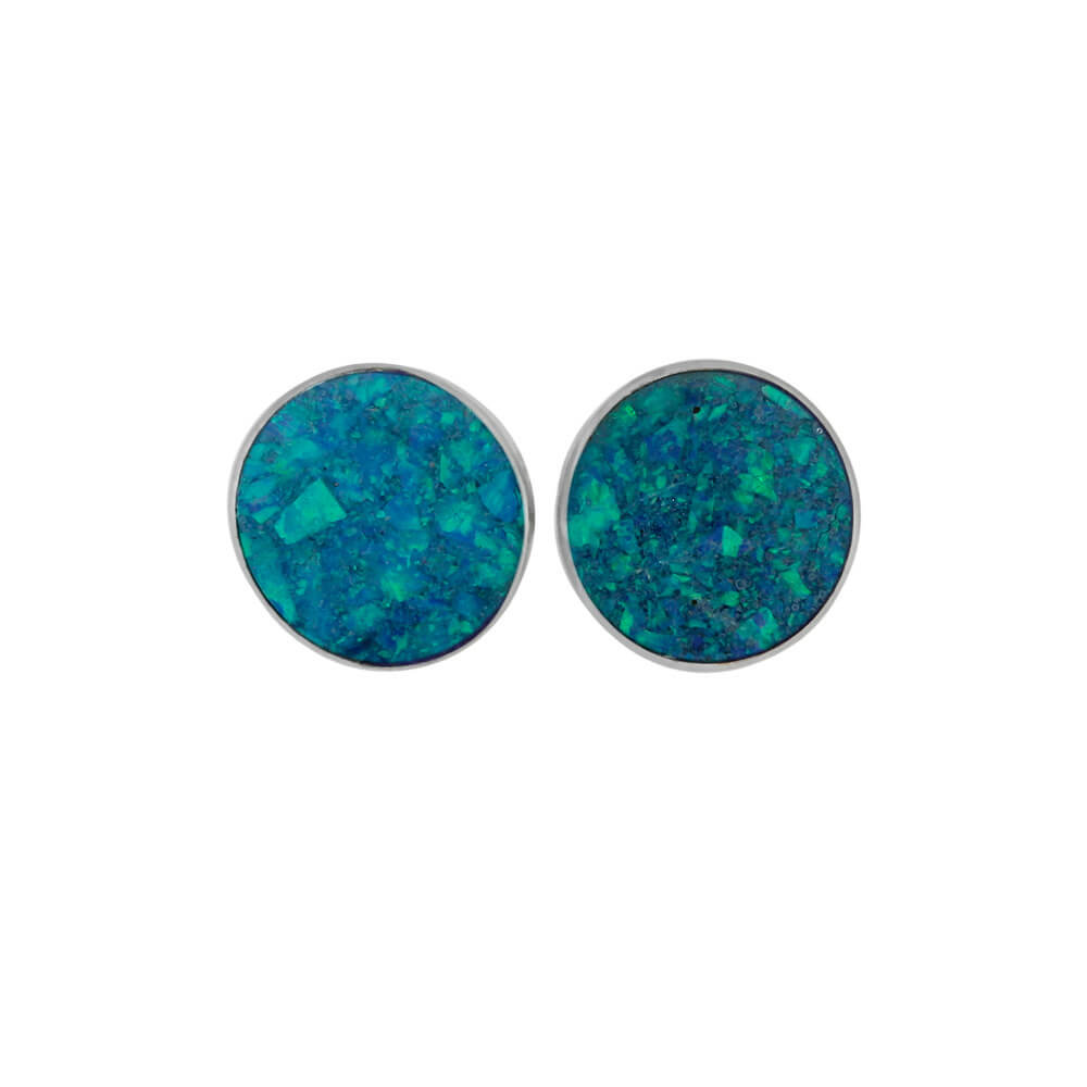 Pair of blue-green opal stud earrings with shimmering synthetic opal in sterling silver. Add color to your look with these vibrant studs.