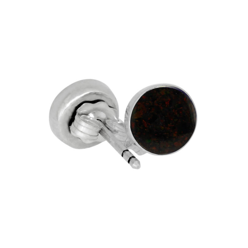 Single black opal stud earring with dark, iridescent synthetic opal in sterling silver. Elegant and mysterious jewelry piece.