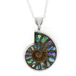 Ammonite fossil pendant with colorful inlay on a white background