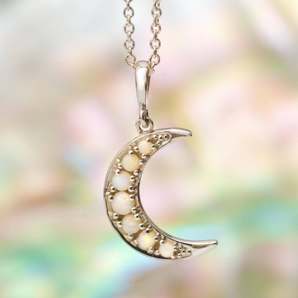 Opal crescent moon necklace with delicate chain