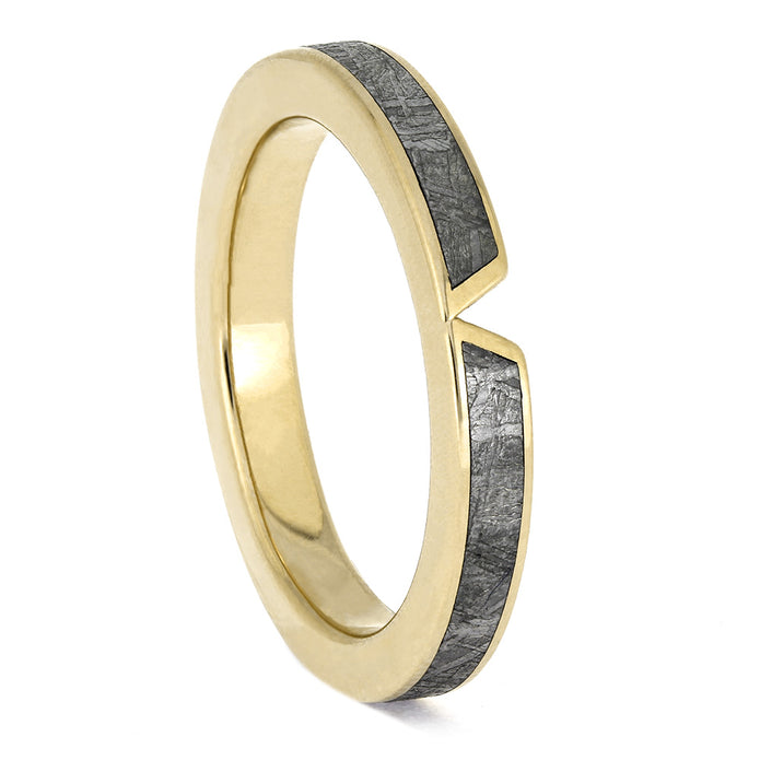 Gold ring with gray interior on a white background