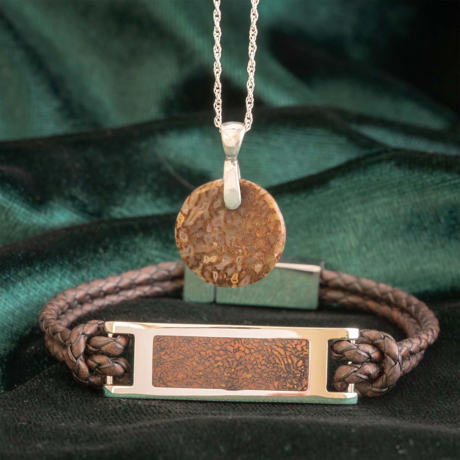 Matching dinosaur bone pendant necklace and leather bracelet set