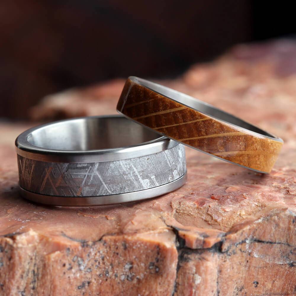 Titanium rings with whiskey barrel oak and meteorite inlays