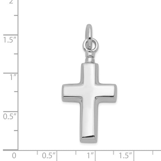 Silver cross pendant with measurement scale on a white background