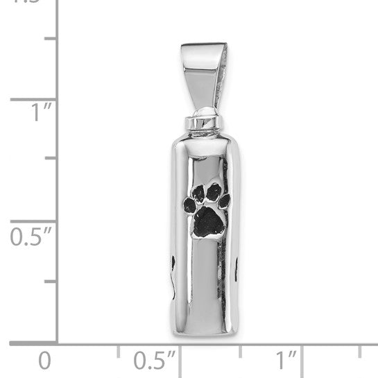 Silver pendant with a paw print design on a white background with measurement scale.