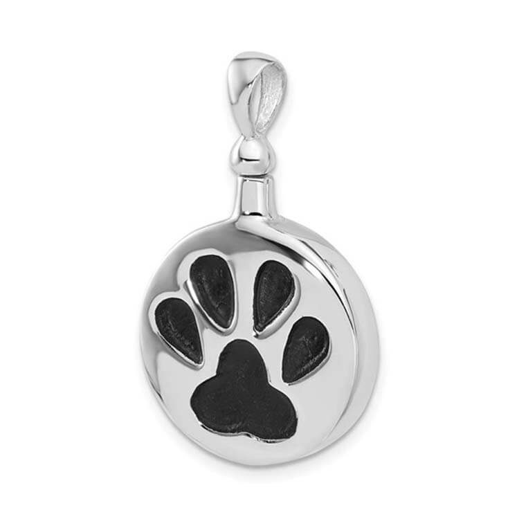Silver pendant with a black paw print design on a white background
