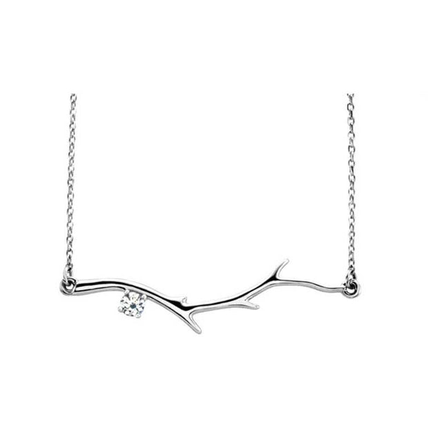 Silver branch-shaped necklace with a diamond on a white background