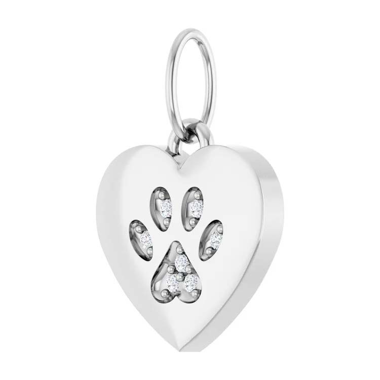 Silver heart-shaped pendant with paw prints on a white background