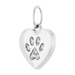 Silver heart-shaped pendant with paw prints on a white background