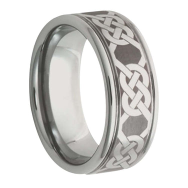 Silver ring with Celtic knot design on a white background