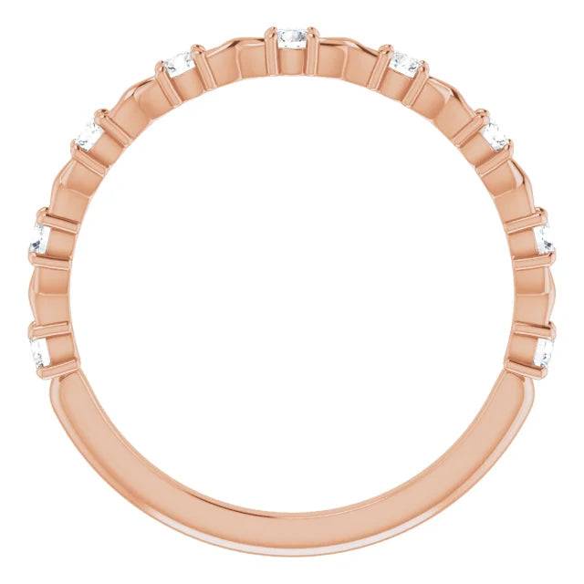 Side view of diamond half eternity band in rose gold