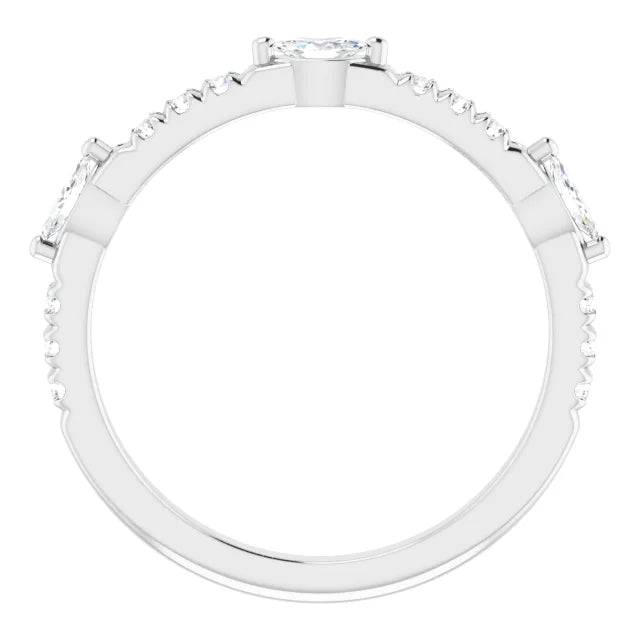 Side view of diamond half eternity band with marquise cuts