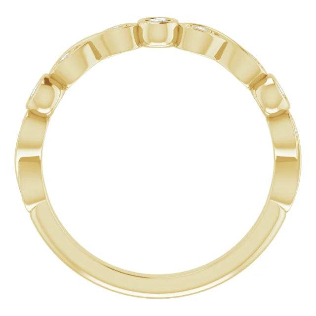 Side view of gold anniversary band with diamonds