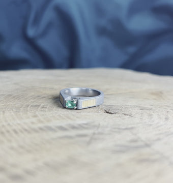 Emerald Ring with Oak Wood Panels and a Sandblasted Titanium