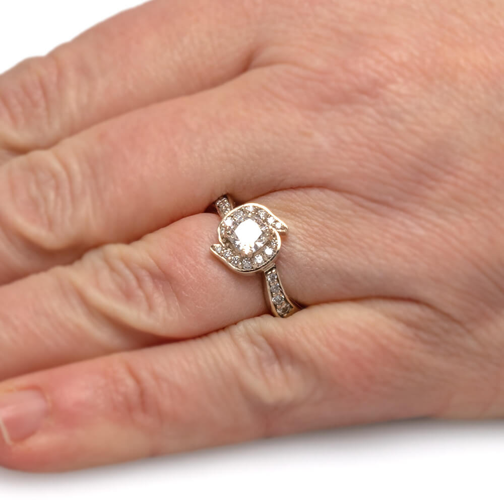 Halo-Style Engagement Ring on Hand