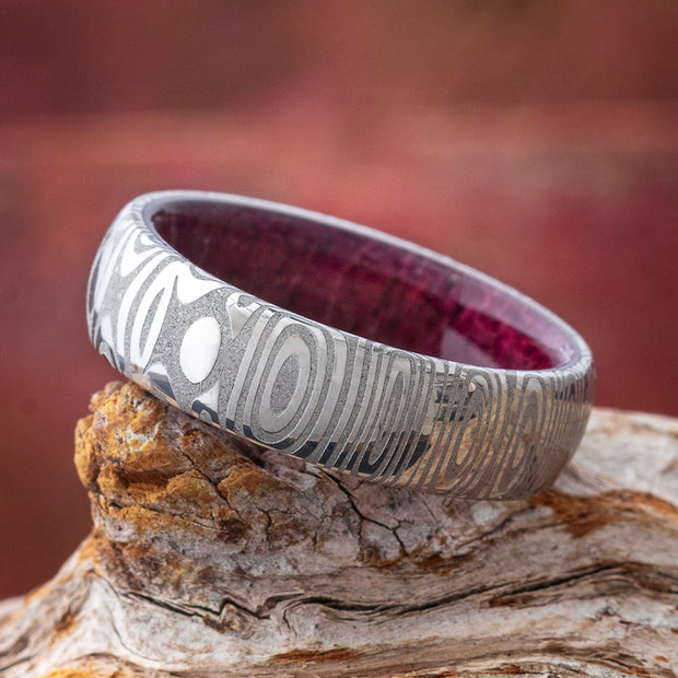 Damascus Wedding Band With Purple Heart Wood Sleeve