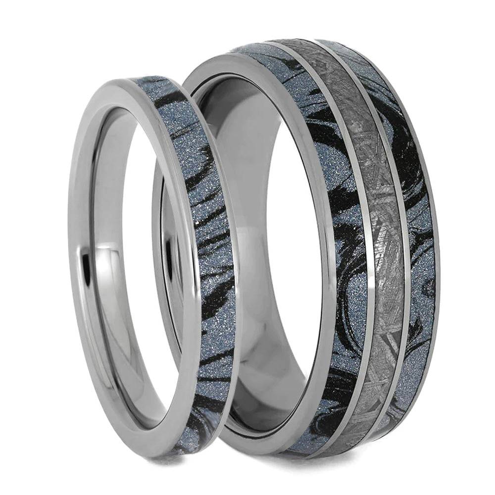 Close-up of blue ring set with meteorite and mokume design