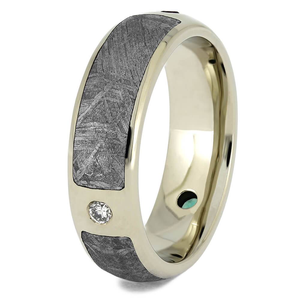 Meteorite ring featuring diamond and gemstones