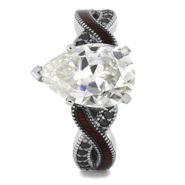 Pear Cut Moissanite Engagement Ring With A Twist Shank - Jewelry by Johan