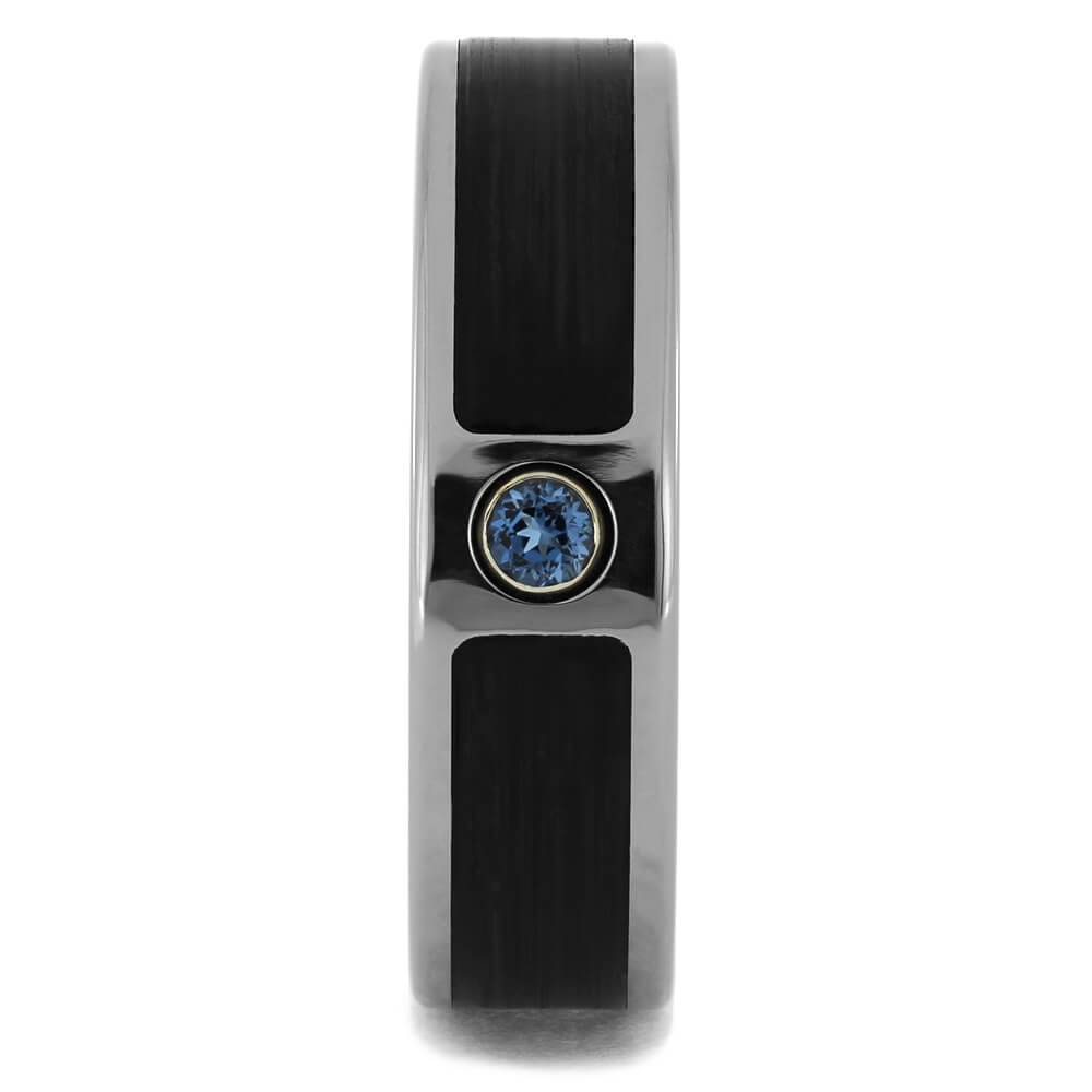 Front view of vinyl record wedding ring with topaz