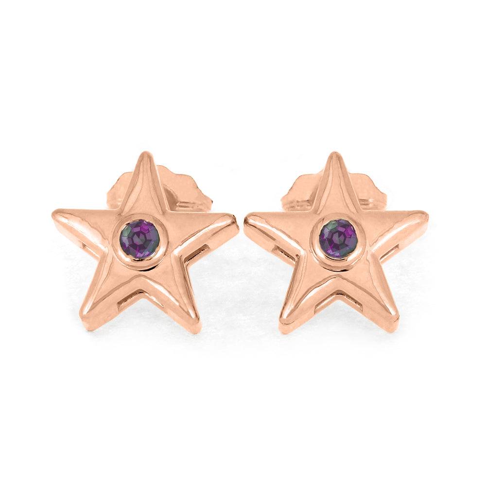 Rose gold star stud earrings with dark purple birthstone