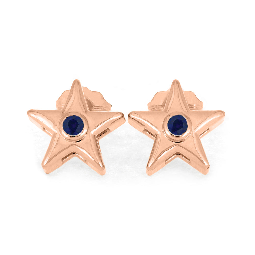 Rose gold star stud earrings with blue birthstone