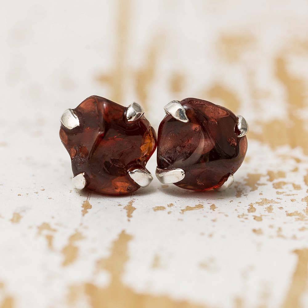 Garnet birthstone stud earrings in silver setting