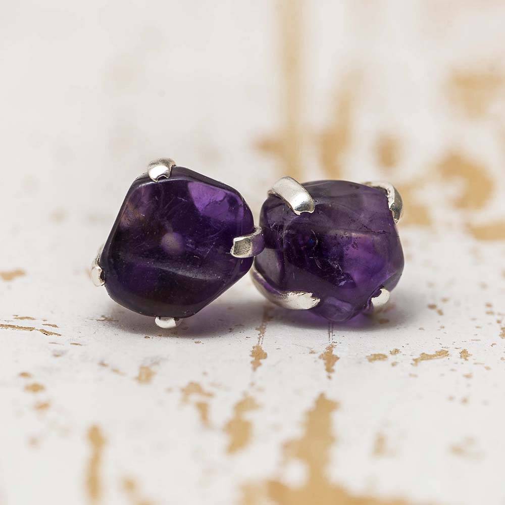 Amethyst birthstone stud earrings in silver setting