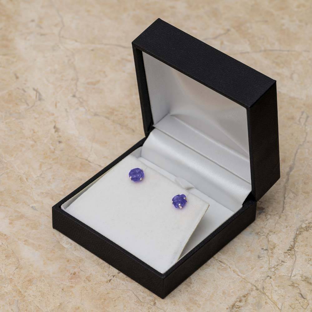 Stud earrings in black jewelry box