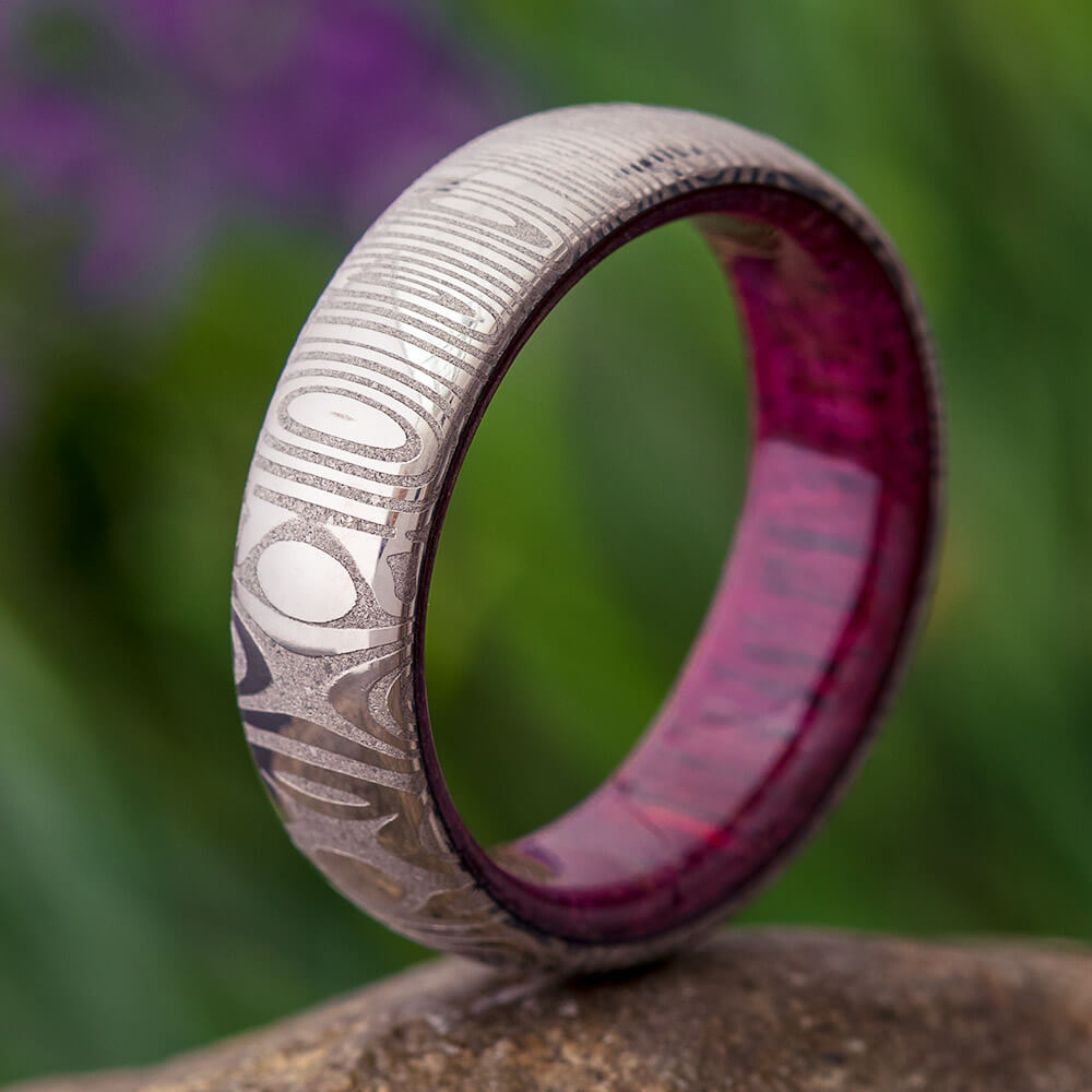 Damascus Wedding Band With Purple Heart Wood Sleeve